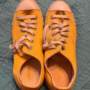 Bright yellow gently used Converse low tops